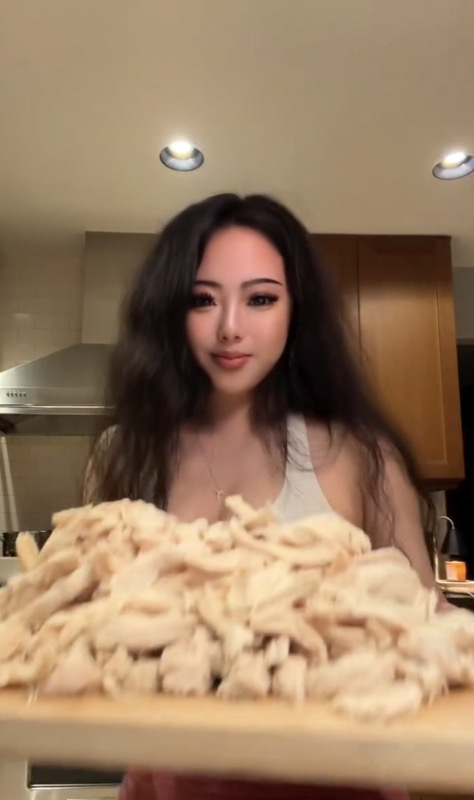 Jade in her kitchen preparing fresh meals